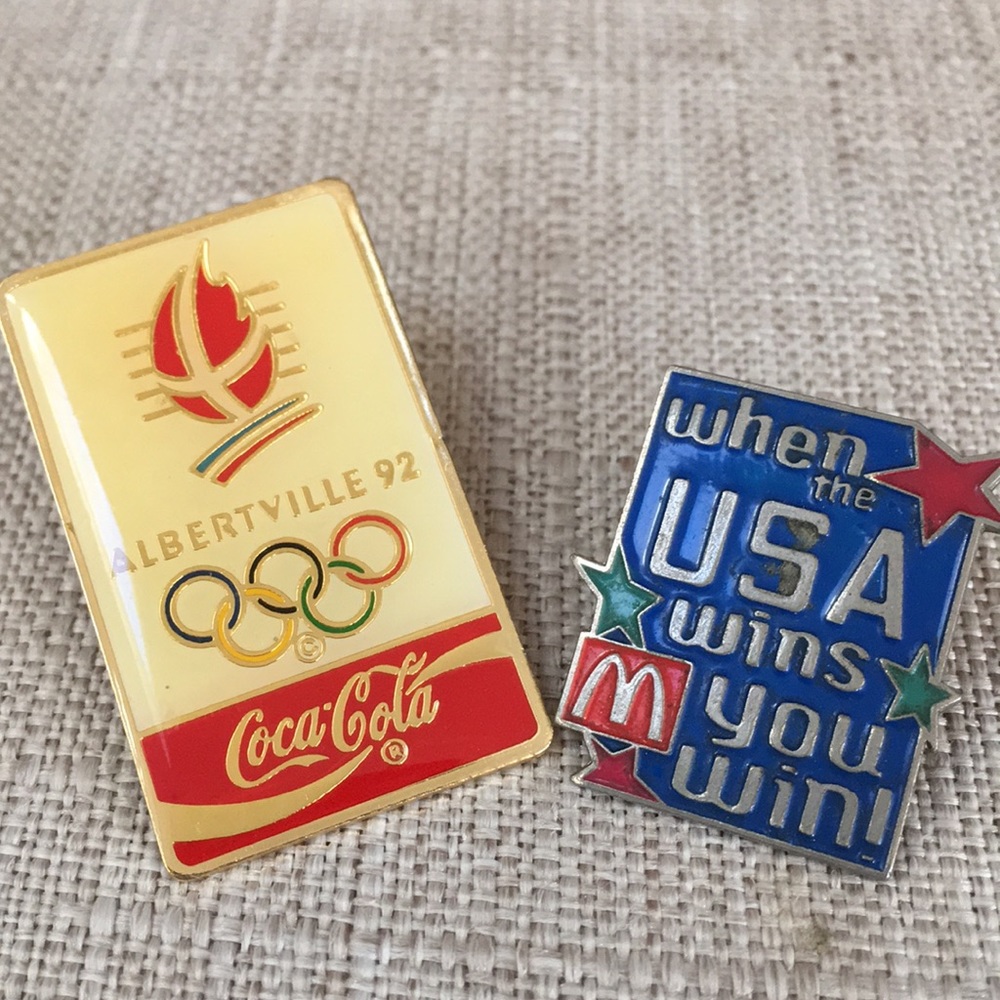 Couple of Olympic pins ,coke, McDonald’s